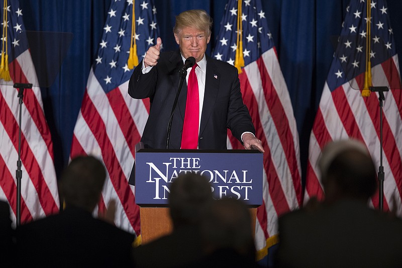 Republican presidential candidate Donald Trump gives a thumbs up after a foreign policy speech at the Mayflower Hotel in Washington, Wednesday, April 27, 2016.
