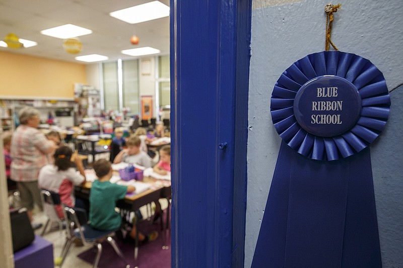 Staff photo by Doug Strickland / A ribbon marking Falling Water Elementary School as a National Blue Ribbon School hangs outside of instructor Nelle Ward's 3rd-grade class last September. in Hixson, Tenn.