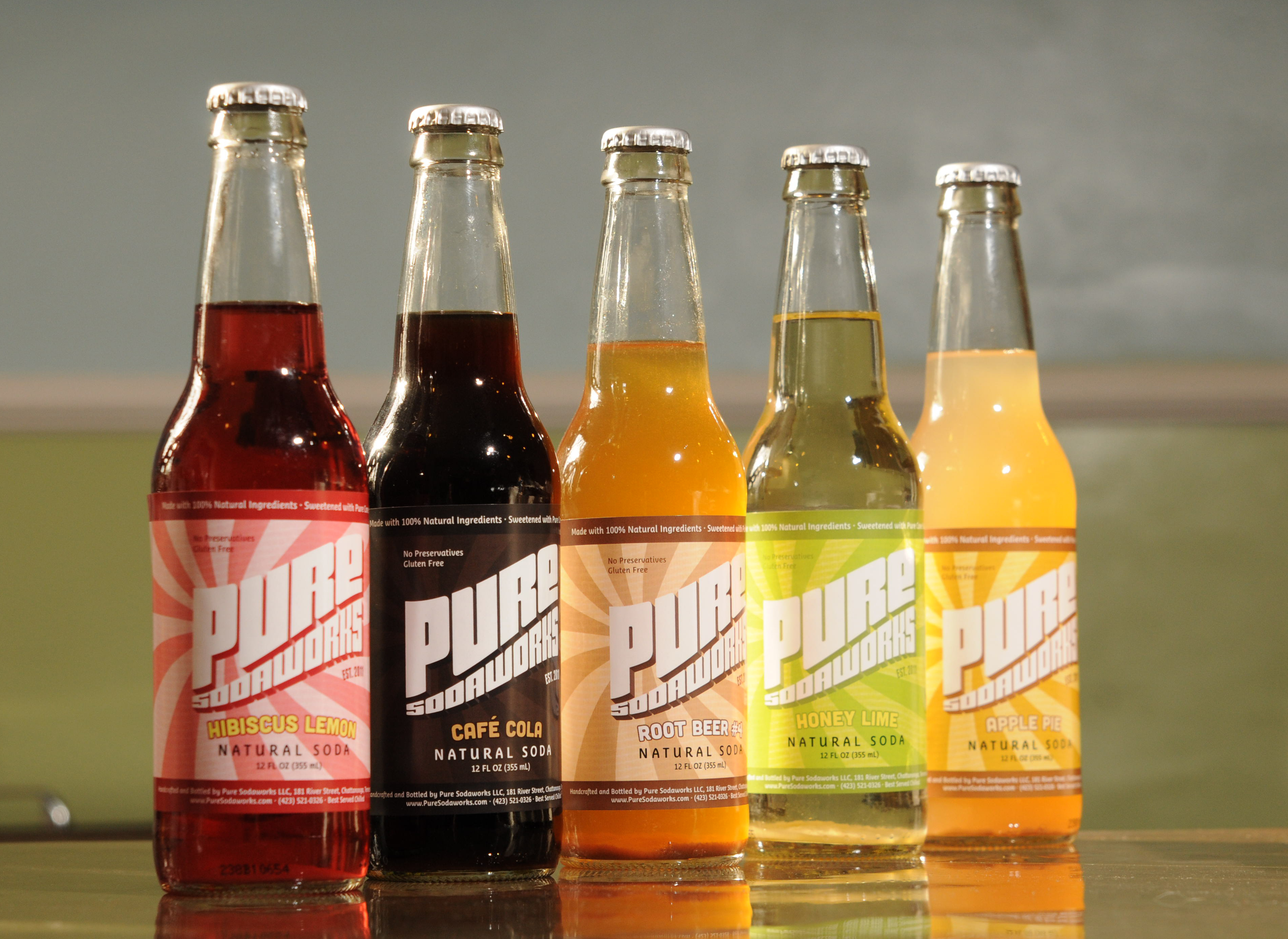 Five bottled flavors of Pure Sodaworks are Hibiscus Lemon, Cafe Cola, Root Beer #4, Honey Lime and Apple Pie. The company's custom bottling machine was purchased using funds generated during a Kickstarter campaign that was recently named a Project We Love by the crowdfunding site.