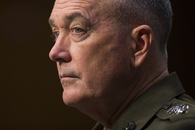 
              Joint Chiefs Chairman Gen. Joseph Dunford listens while testifying on Capitol Hill in Washington, Thursday, April 28, 2016, before the Senate Armed Services Committee hearing on the Islamic State group. Sen. John McCain, R-Ariz., the chairman of the GOP-led Armed Services Committee is calling the U.S. response to the extremists reactive, slow, and insufficient. (AP Photo/Evan Vucci)
            