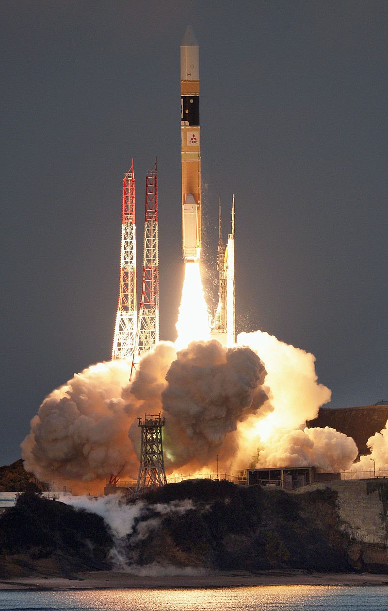 
              FILE - In this Feb. 17, 2016 file photo, an H-2A rocket carrying an X-ray astronomy satellite called "Hitomi", is launched from the Tanegashima Space Center in Kagoshima Prefecture, southern Japan.  Japan’s space agency has abandoned its efforts to restore the operations of a multimillion-dollar satellite that was to probe the mysteries of black holes using X-ray telescopes. (Kyodo News via AP, File) JAPAN OUT, MANDATORY CREDIT
            