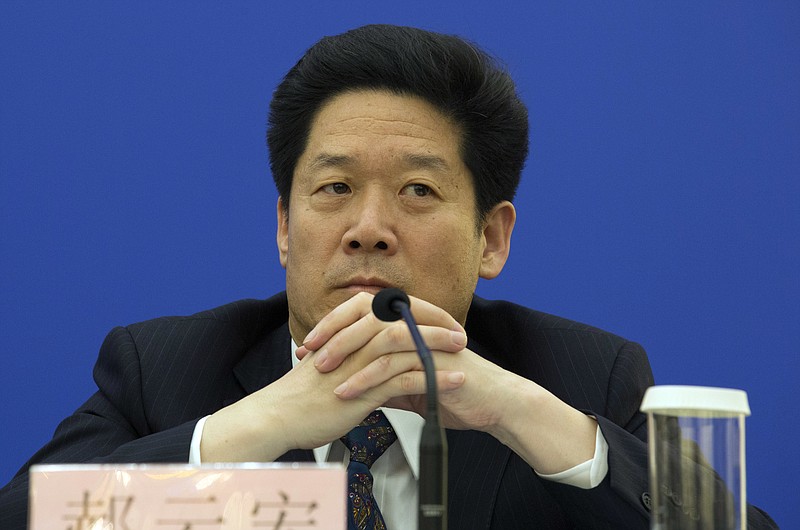 
              Han Yunhong, an official from the Public Security Bureau listens to questions during a press conference about a law regulating overseas non-governmental organizations held at the Great Hall of the People in Beijing, China, Thursday, April 28, 2016. China passed a much-debated law on foreign non-governmental organizations on Thursday in a move in which Beijing says would better serve the groups but critics are concerned would further restrict them by subjecting them to close police supervision. (AP Photo/Ng Han Guan)
            