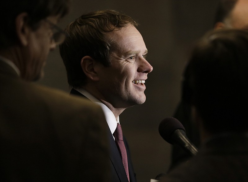 
              FILE - In this Tuesday, Jan. 12, 2016 file photo, Rep. Jeremy Durham, R-Franklin, speaks with reporters following a House Republican caucus meeting on the opening day of the second session of the 109th General Assembly, in Nashville, Tenn. Durham is the subject of a sexual harassment investigation by the state attorney general. (AP Photo/Mark Humphrey, File)
            