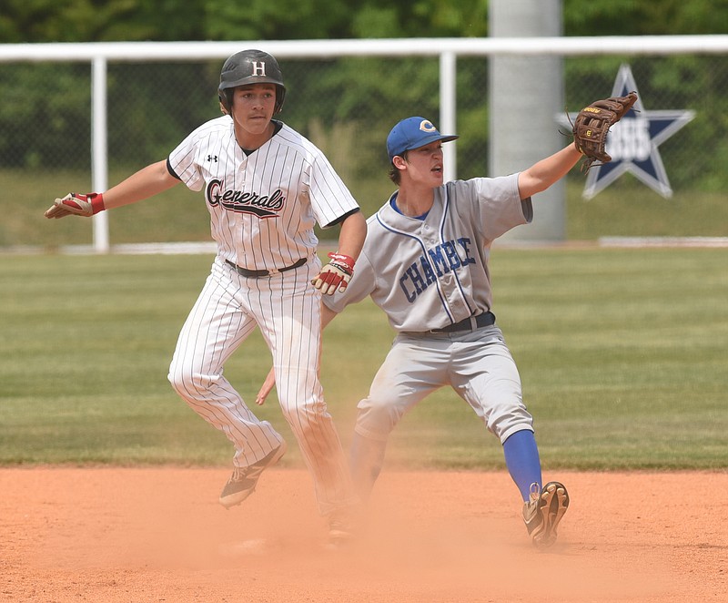 Chamblee short stop Justin Johnson, right, awaits the throw at second as Heritage's Josh Gibson checks before also stealing third on a throwing error during Friday's Class AAAA state baseball double-header in Ringgold.