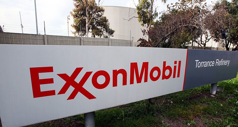 
              FILE - This Jan. 30, 2012, file photo, shows the sign for the Exxon Mobil Torrance Refinery in Torrance, Calif. Exxon Mobil Corp. reports financial results Friday, April 29, 2016. (AP Photo/Reed Saxon, File)
            