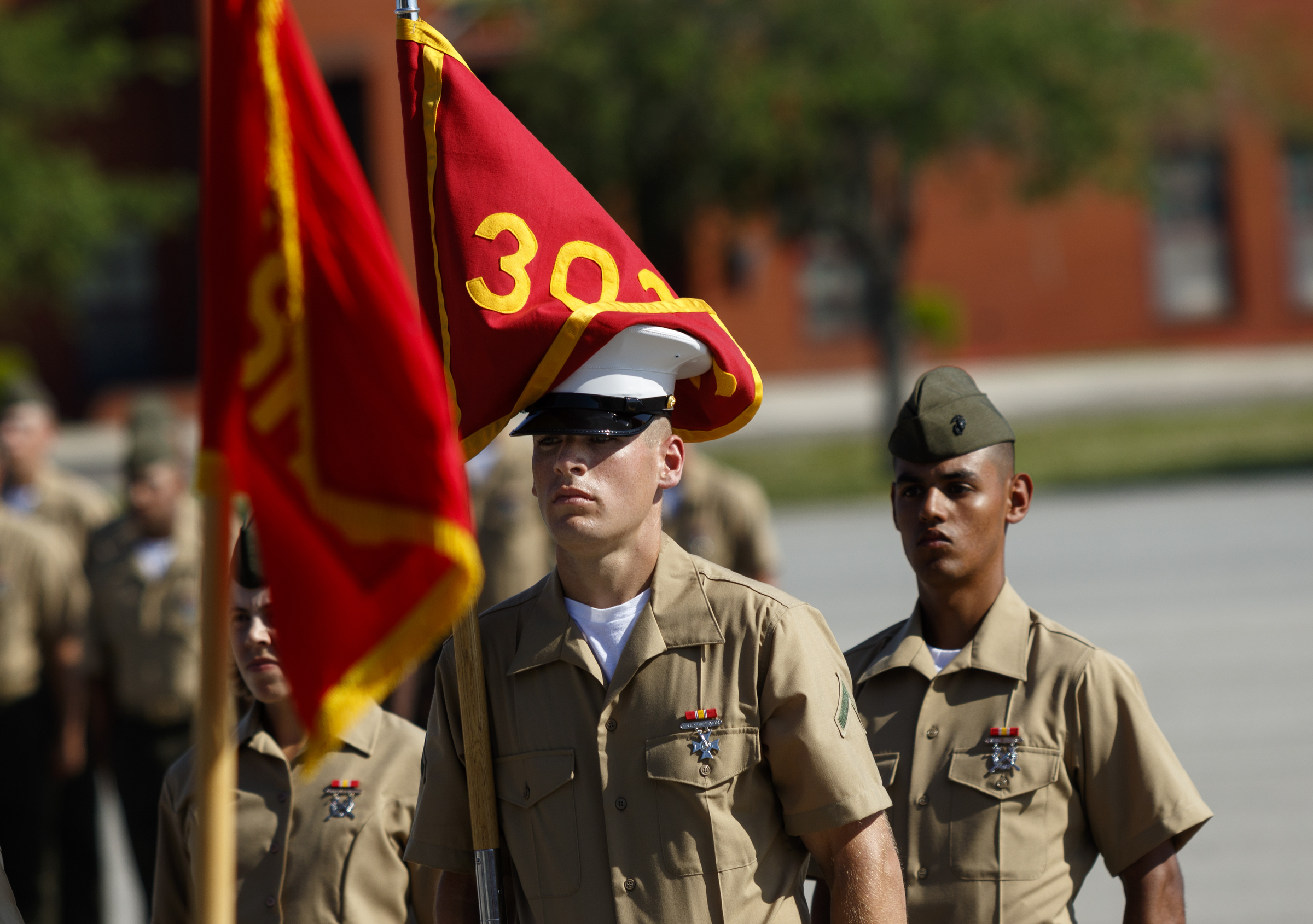 A guidon gets caught on a new Marine's hat during a graduation ceremony at the Marine Corps Recruit Depot on Friday, April 29, 2016, in Parris Island, South Carolina. 379 new Marines graduated from boot camp Friday.