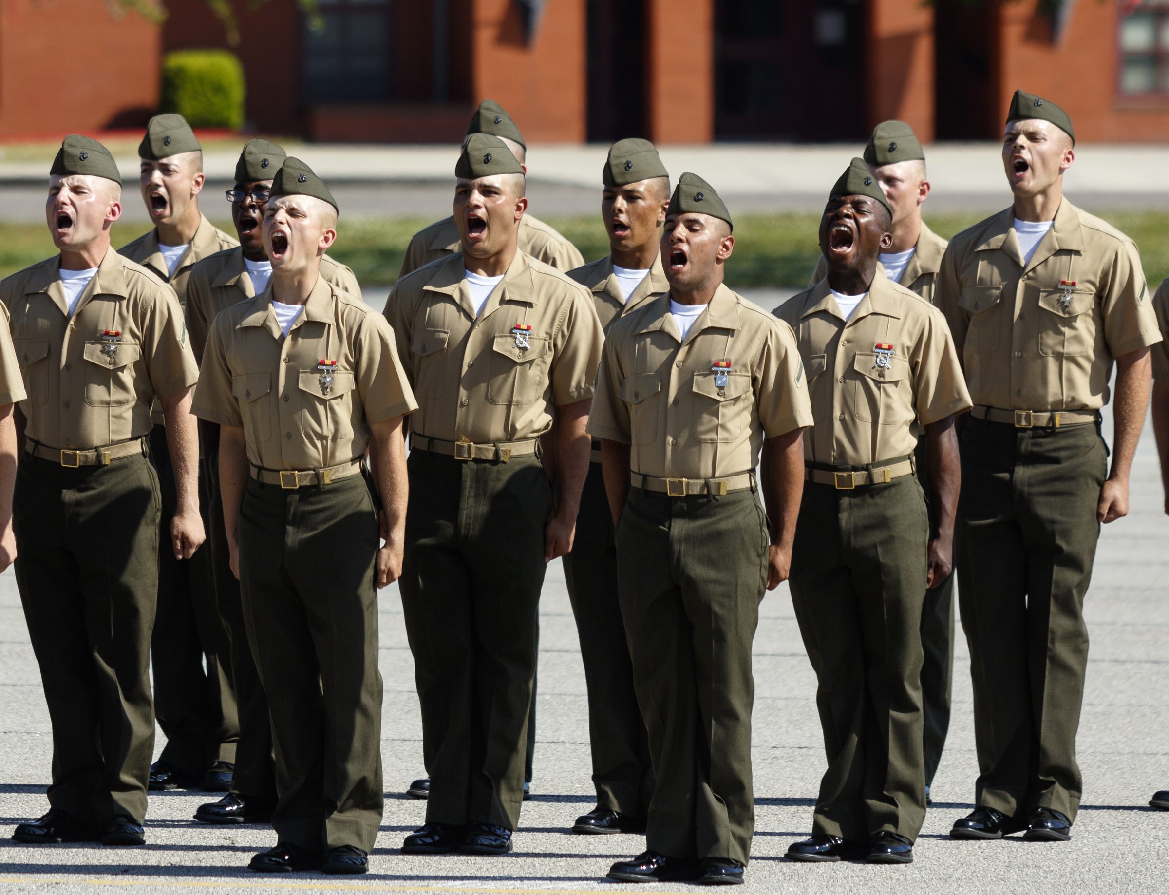 Newly graduated Marines answer their drill instructors as they are released upon their graduation from boot camp at the Marine Corps Recruit Depot on Friday, April 29, 2016, in Parris Island, South Carolina. 379 new Marines graduated from boot camp Friday.
