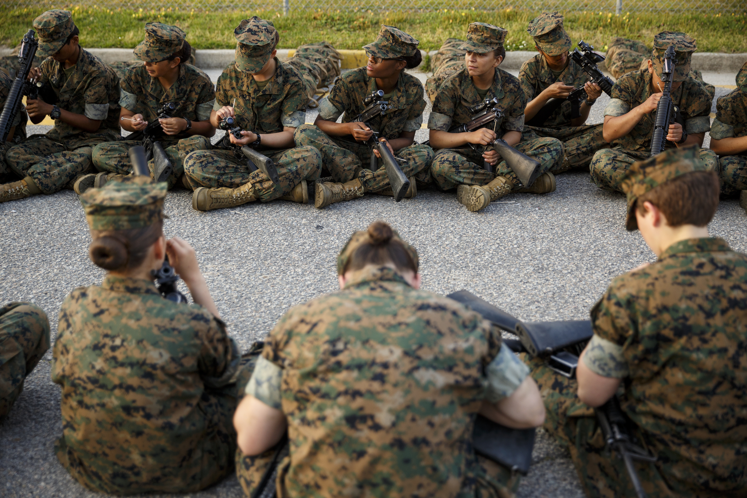 Marine recruits clean their rifles at the Marine Corps Recruit Depot on Tuesday, April 26, 2016, in Parris Island, South Carolina.