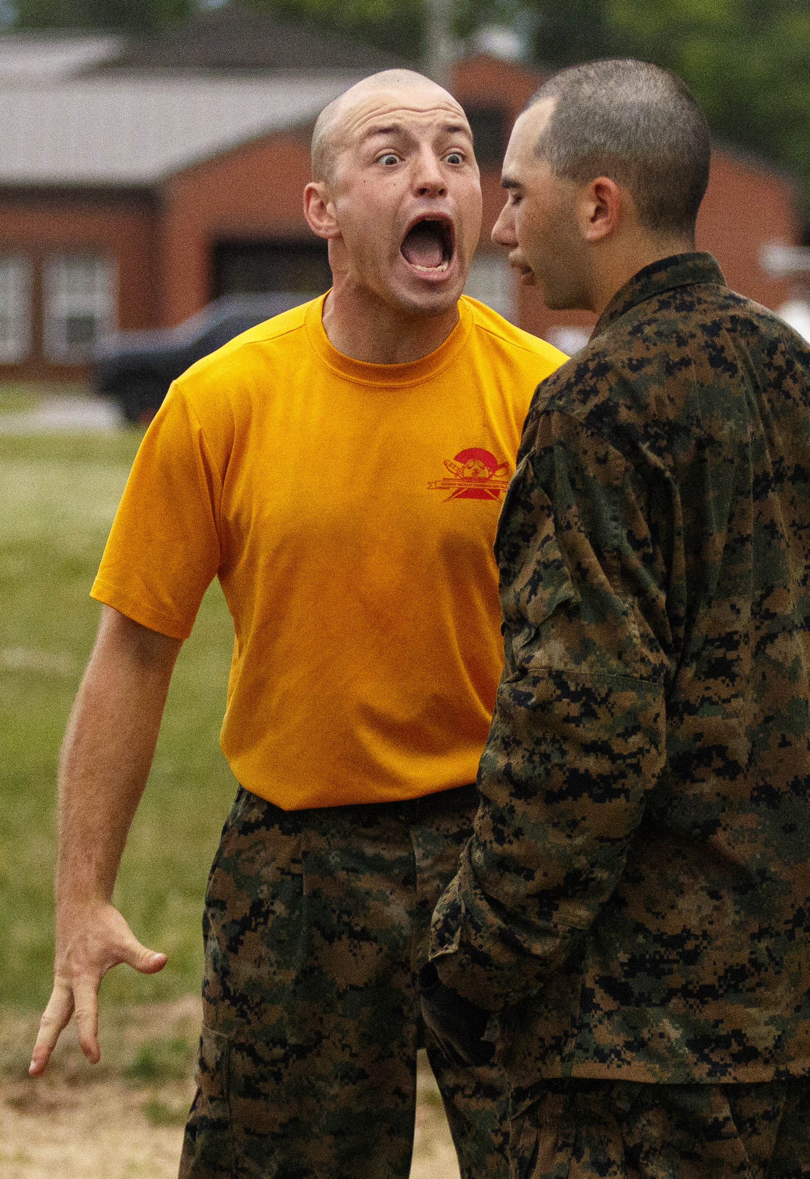A drill instructor shouts to a recruit as they go through morning PT at the Marine Corps Recruit Depot on Thursday, April 28, 2016, in Parris Island, South Carolina.
