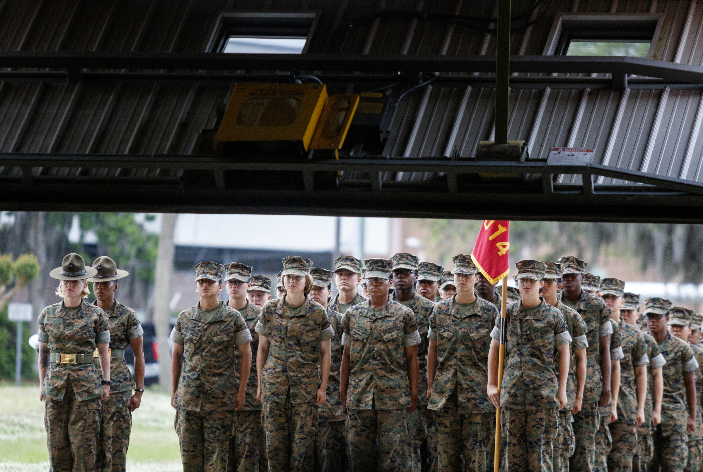 A door raises to reveal new Marines to their families the day before graduation on family day at the Marine Corps Recruit Depot on Thursday, April 28, 2016, in Parris Island, South Carolina.