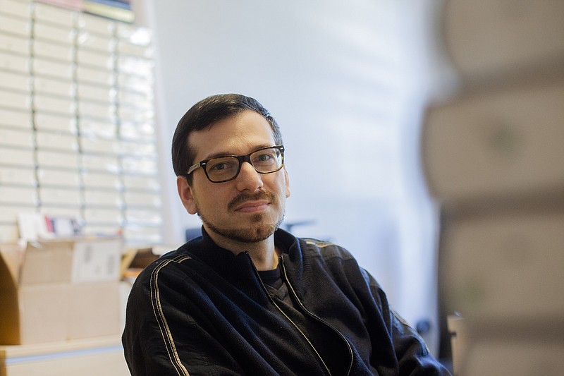 
              In this photo taken Wednesday, March 9, 2016 psychologist Ozgur Cengiz, whose grandparents emigrated from Turkey as guest workers sits his office during an interview with the Associated Press in Berlin, Germany, Wednesday, March 9, 2016. Germany is seeking to quickly integrate migrants into nation’s society and labor force after arrival of over 1 million last year, with Syrians making up the largest group. (AP Photo/Markus Schreiber)
            