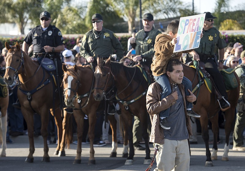 Protesters demonstrate at a Donald Trump rally at The Pacific Amphitheater in Costa Mesa, Calif., last week.