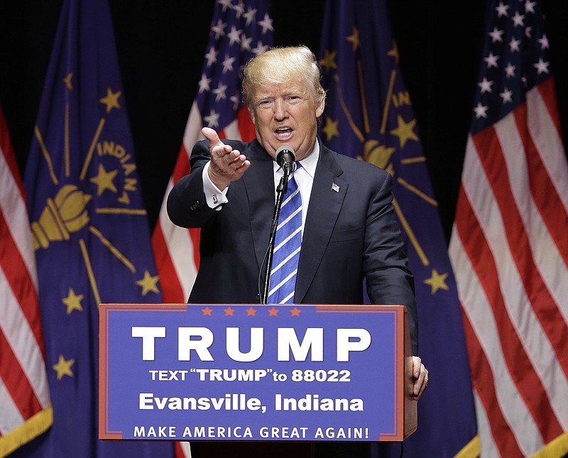 
              FILE - In this April 28, 2016 file photo, Republican presidential candidate Donald Trump speaks in Evansville, Ind. After toying with gender politics off and on during the campaign, Donald Trump is all in on a mission to undercut Hillary Clinton’s credentials by syncing up his say-anything campaign strategy with his alpha-male persona. (AP Photo/Darron Cummings, File)
            