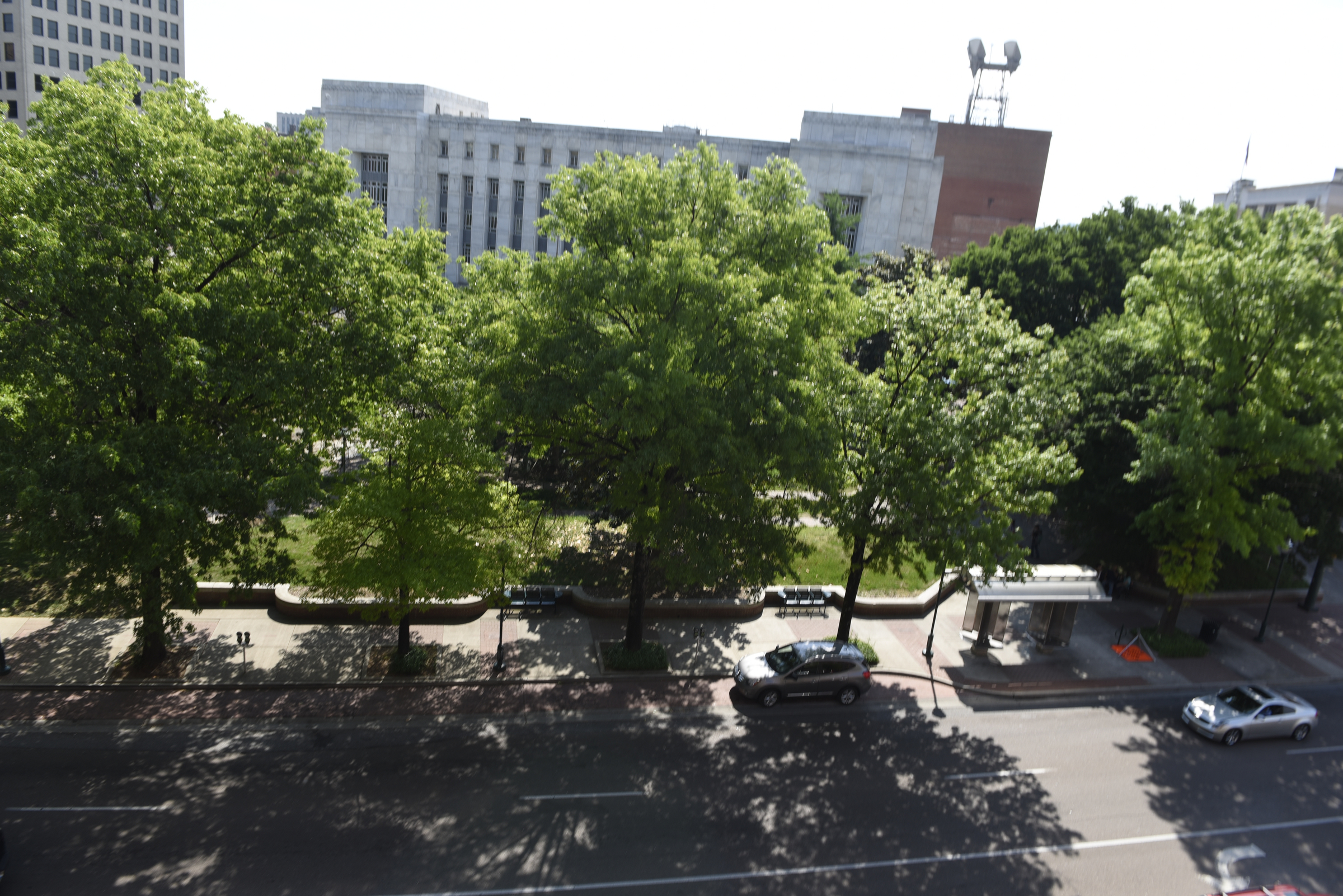Mature trees block the view of Miller Park, photographed from the EPB parking garage on Wednesday, Apr. 27, 2016, in Chattanooga, Tenn.