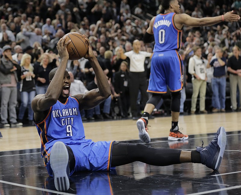 
              Oklahoma City Thunder forward Serge Ibaka (9) celebrates the teams win over the San Antonio Spurs in Game 2 of a second-round NBA basketball playoff series, Monday, May 2, 2016, in San Antonio. Oklahoma City won 98-97. (AP Photo/Eric Gay)
            
