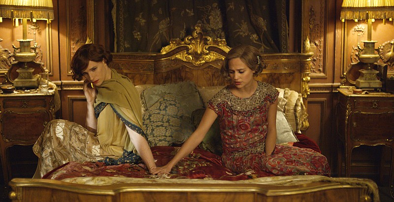 
              FILE - This file photo provided by Focus Features shows, Eddie Redmayne, left, as Lili Elbe, and Alicia Vikander as Gerda Wegener, in Tom Hooper’s "The Danish Girl." Hollywood films remained static in their inclusiveness of LGBT characters in 2015, but the racial diversity of those characters fell dramatically, according to the findings of GLAAD's annual study released on Monday, May 2, 2016. The studios' art house divisions, like Focus Features and Fox Searchlight, fared better overall with releases like "The Danish Girl," ''Grandma" and "Chi-Raq." (Agatha A. Nitecka/Focus Features via AP, File)
            