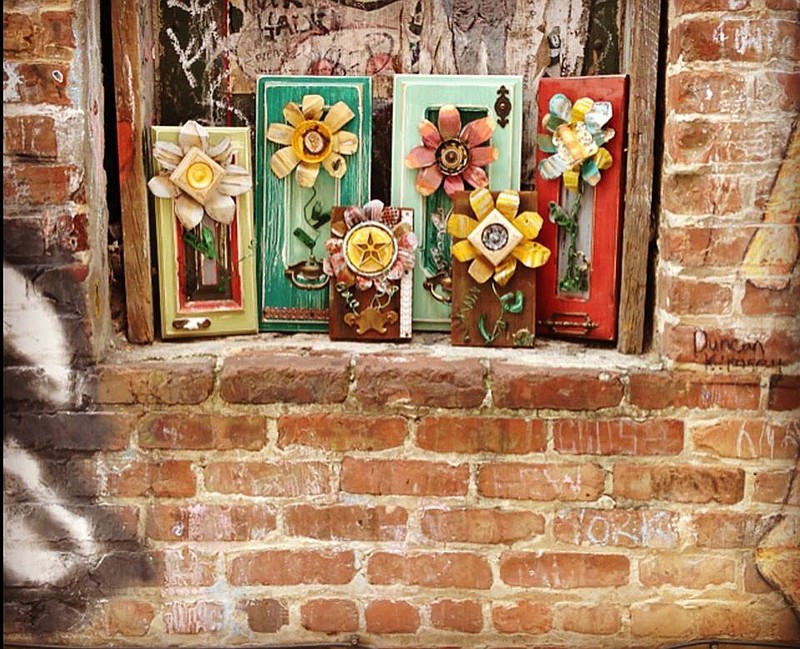 Flowers may come in unexpected forms at the Mother's Day Pop-Up Market at Miller Plaza on Friday. These artful ones were designed by Tangerinas, a boutique that specializes in original art from recycled materials.