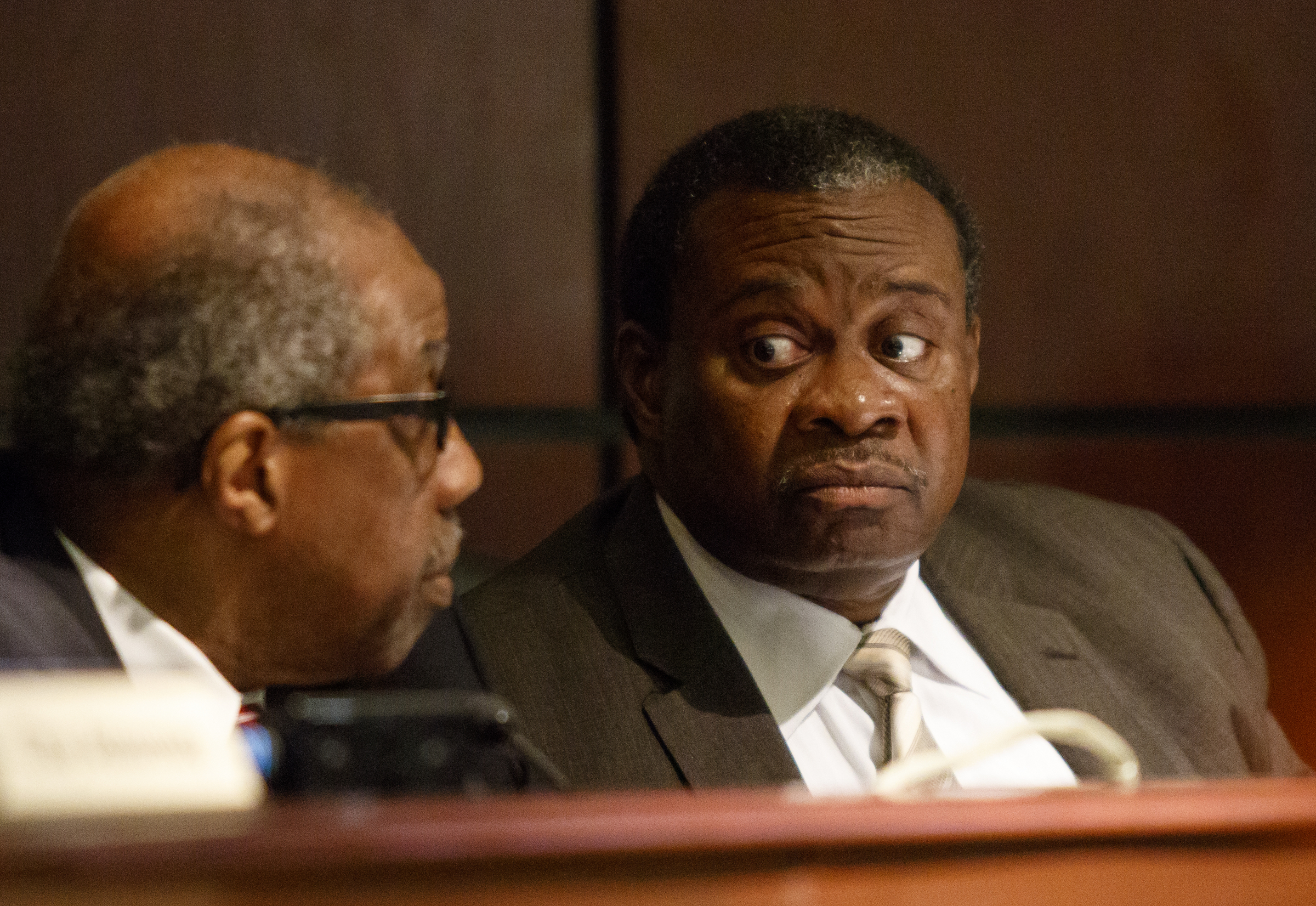 Councilman Yusuf Hakeem, right, talks with Councilman Moses Freeman during a Chattanooga City Council Meeting on Tuesday, May 3, 2016, in Chattanooga, Tenn. Kevin Muhammad, with the Nation of Islam, delivered what he called a