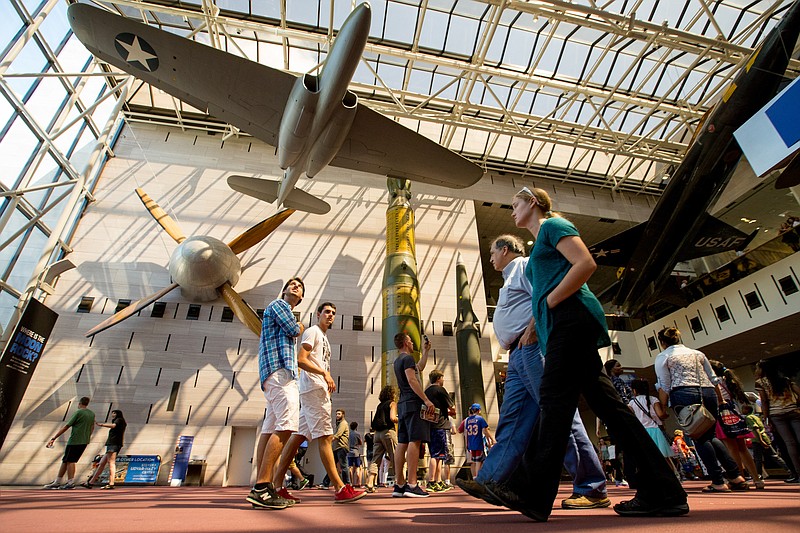 
              In this photo taken April 19, 2015,  people walk in the Smithsonian National Air and Space Museum in Washington. A record number of U.S. tourists visited Washington last year.
The city’s tourism bureau, Destination DC, announced Tuesday, May 3, 2016, that the nation’s capital welcomed 19.3 million domestic visitors in 2015. That’s up one million from the 2014 total, and it shows the continuing strength of Washington’s tourism industry after the Great Recession. (AP Photo/Andrew Harnik)
            