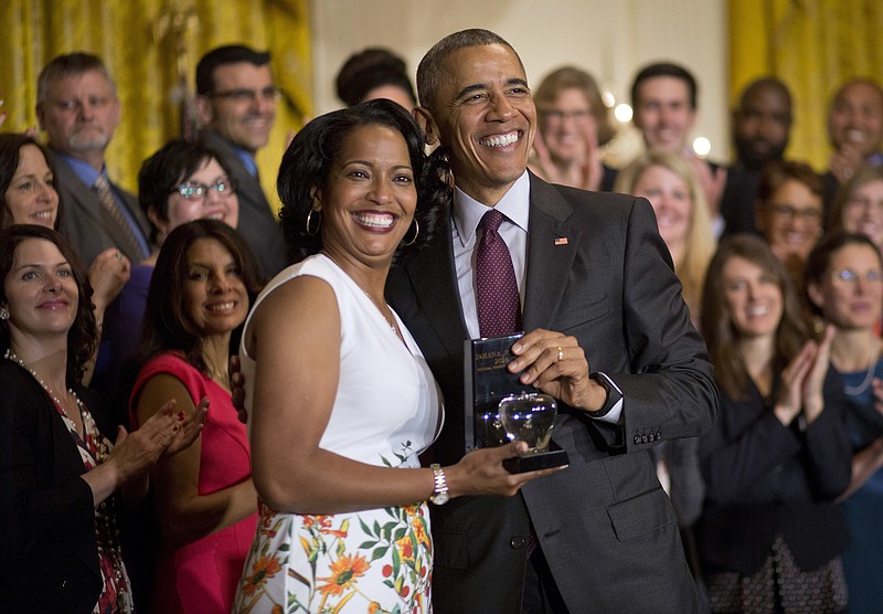 
              President Barack Obama awards the 2016 National Teacher of the Year to Jahana Hayes, Tuesday, May 3, 2016, during a ceremony in the East Room of the White House in Washington. Hayes is a Social Studies yeacher at John F. Kennedy High School in Waterbury, Conn. (AP Photo/Pablo Martinez Monsivais)
            