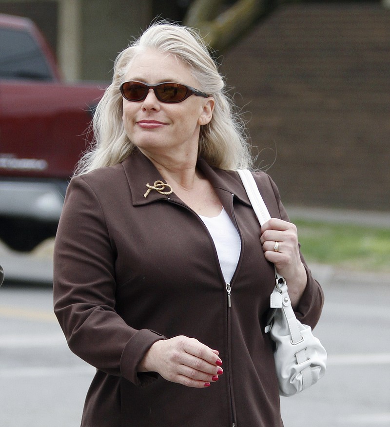 
              FILE - In this April 20, 2011 file photo, Angel Dillard of Valley Center, Kan. arrives at the U.S. Federal District Courthouse in Wichita, Kan. Opening statements are expected Tuesday, May 3, 2016, in the 2011 lawsuit brought by the U.S. Department of Justice against Dillard, an anti -abortion activist, over a letter she sent to a Wichita physician saying someone might place an explosive under the doctor's car. (AP Photo/Jeff Tuttle, File)
            