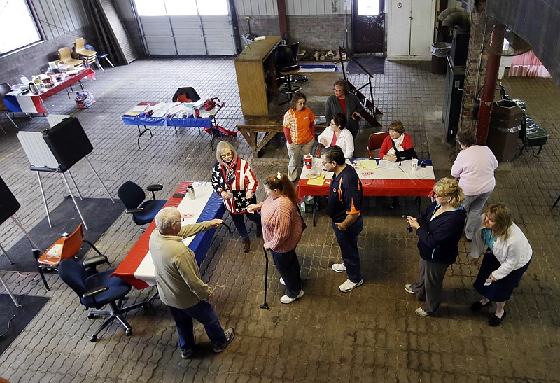 Voters wait to cast their ballot in the Indiana Primary at the Hamilton Co. Auto Auction on Tuesday, May 3, 2016, in Noblesville, Ind.