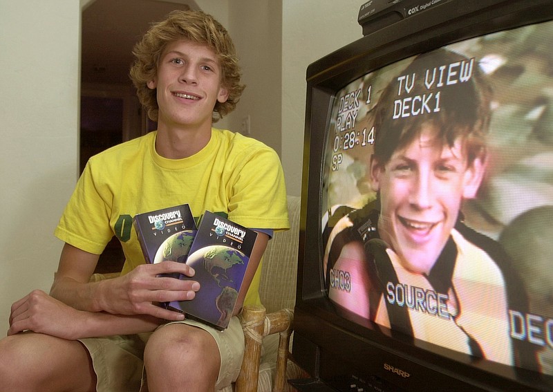 In this Nov. 6, 2002, photo, Charlie Keating IV, 16, poses for a photo in Phoenix for an upcoming series on the Discovery channel that he took part in. The Navy SEAL killed in Iraq on Tuesday, May 3, 2016, was identified as Charlie Keating IV, 31, a former Phoenix high school star distance runner and the grandson of the late Arizona financier involved in the 1980s savings and loan scandal.