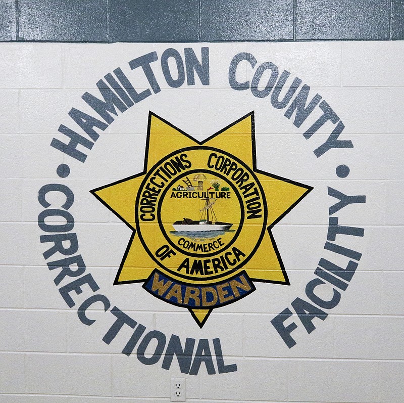 A sign with Hamilton County and CCA indicating the warden's office is seen Tuesday, June 30, 2015, at Silverdale Correctional Facility in Chattanooga, Tenn.