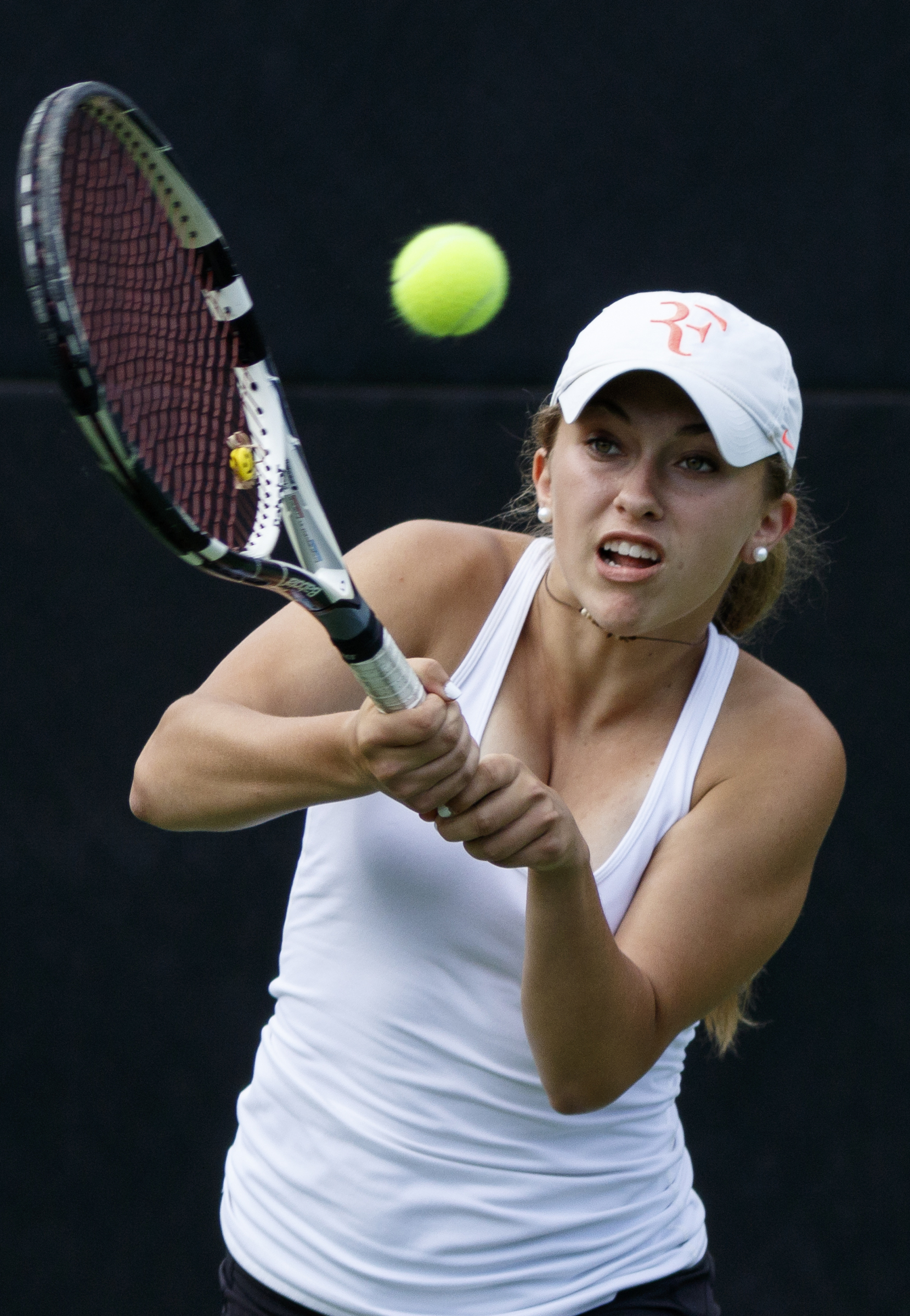 Baylor tennis player Drew Hawkins returns the ball during a doubles match with partner Lauren Carelli against GPS's Maddox Bandy and Jenna Thorstensen during their tennis match at Baylor School on Wednesday, April 4, 2016, in Chattanooga, Tenn.