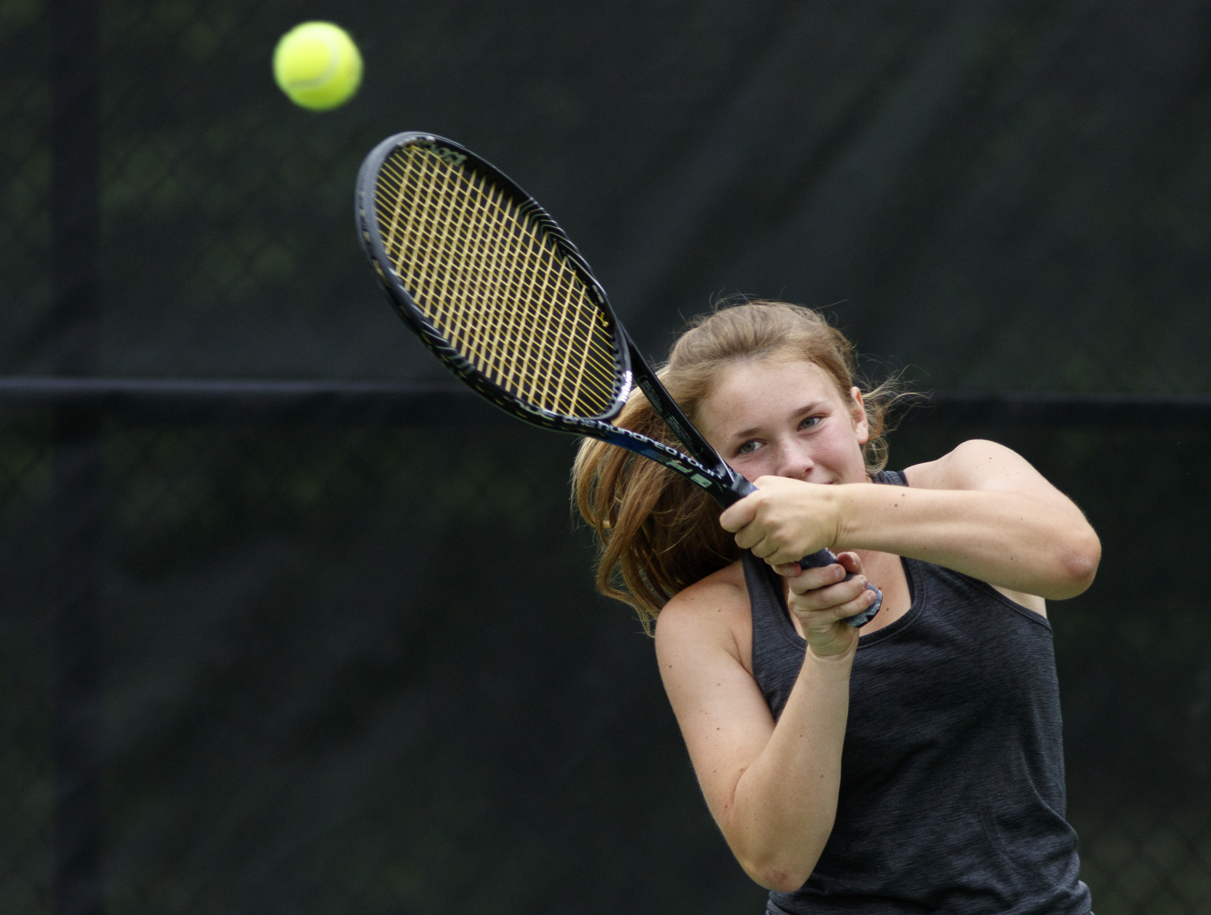 GPS tennis player Corrinne Spann returns the ball during a doubles match with partner Ellie Edwards against Baylor's Ashton Jenne and Presley Thomas during their tennis match at Baylor School on Wednesday, April 4, 2016, in Chattanooga, Tenn.
