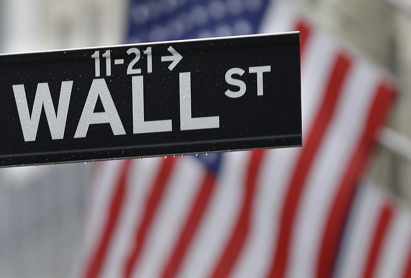 
              FILE - This July 9, 2015, file photo, shows a Wall Street sign near the New York Stock Exchange. A weak Chinese manufacturing survey weighed on European markets Tuesday, May 3, 2016. Australia's stock index was the standout performer after the Australian central bank surprised many in the markets by cutting interest rates. (AP Photo/Seth Wenig, File)
            