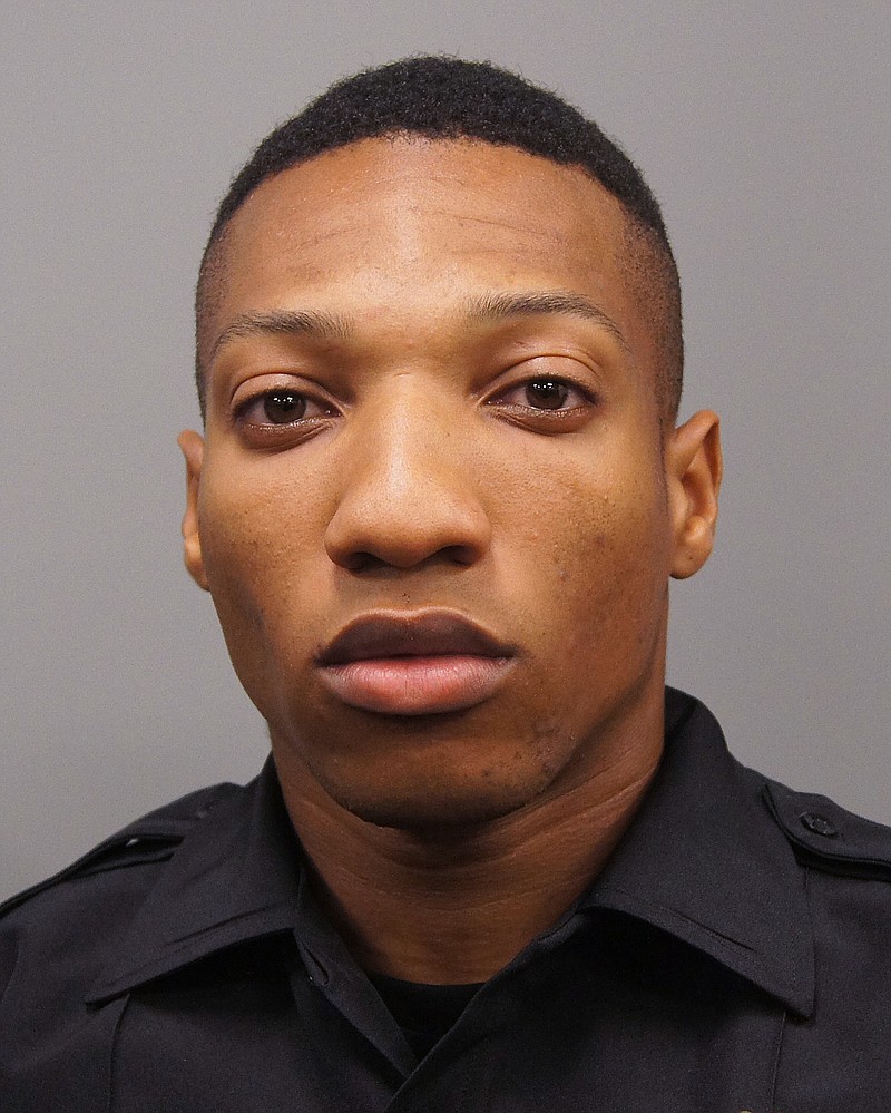 
              In this undated photo released by the DeKalb County (Ga.) Police Department, Vancito Gumbs poses for a photo, in Georgia. Gumbs, who prosecutors say was a member of the Gangster Disciples while also serving as a police officer in DeKalb County, just outside Atlanta. Gumbs said in August, 2015, that he killed people as a hit man for the gang, the indictment says. Alleged members of the Gangster Disciples, including high-ranking leaders and an Atlanta-area police officer who prosecutors say claimed to be a hit man for the gang, have been charged with racketeering in a federal indictment unsealed Wednesday, May 4, 2016. ( DeKalb County Police Department via AP)
            