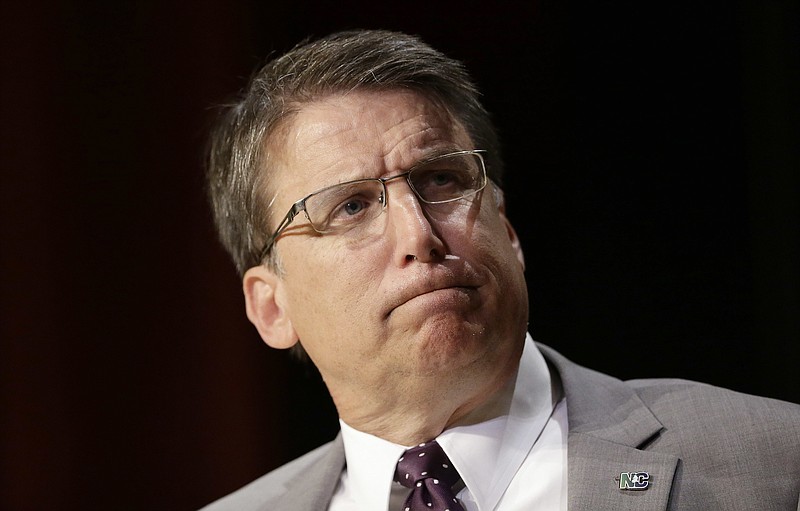 
              North Carolina Gov. Pat McCrory pauses while making comments concerning House Bill 2 during a government affairs conference in Raleigh, N.C., Wednesday, May 4, 2016. A North Carolina law limiting protections to LGBT people violates federal civil rights laws and can't be enforced, the U.S. Justice Department said Wednesday, putting the state on notice that it is in danger of being sued and losing hundreds of millions of dollars in federal funding. (AP Photo/Gerry Broome)
            