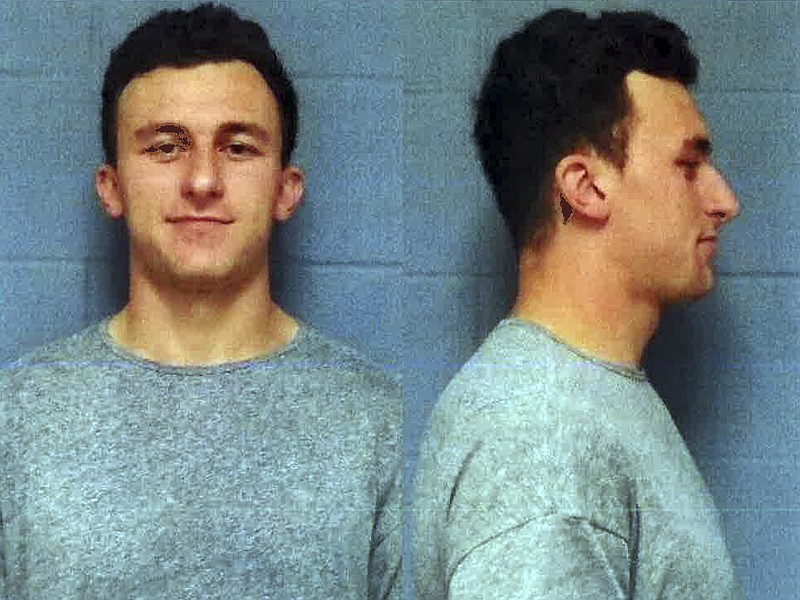 
              This booking photo provided by the Highland Park, Texas, Department of Public Safety, shows former Cleveland Browns quarterback Johnny Manziel, who was booked and posted bond Wednesday, May 4, 2016, in a domestic violence case, one day before he faces his first court hearing. The Heisman Trophy winner and former Texas A&M star was indicted by a grand jury last month after his ex-girlfriend alleged he hit her and threatened to kill her during a night out in January.  (AP Photo/Highland Park Department of Public Safety)
            