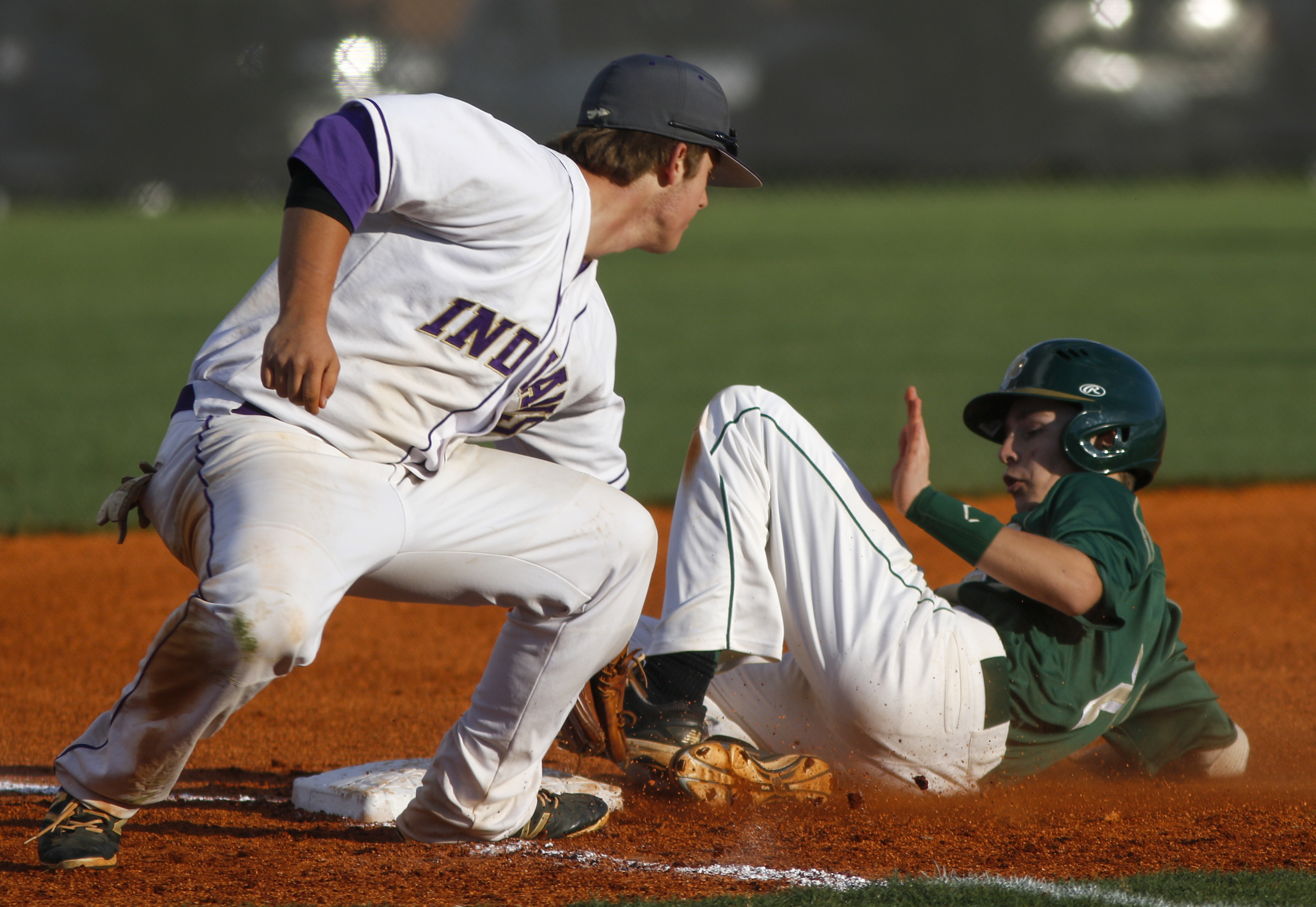 Notre Dame runner Aiden Krehl beats a tag by Sequatchie County 3rd baseman Tucker Hall at 3rd during their District 7-AA baseball tournament play-in game at Sequatchie County High School on Thursday, May 5, 2016, in Dunlap, Tenn.