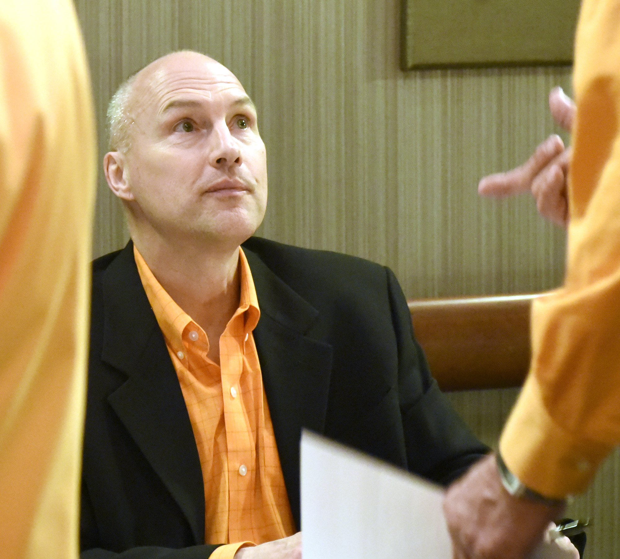 UT assistant women's basketball coach Dean Lockwood talks to fans in the autograph line.  The University of Tennessee Big Orange Caravan rolled into town at the Chattanoogan on Thursday May 5, 2016.