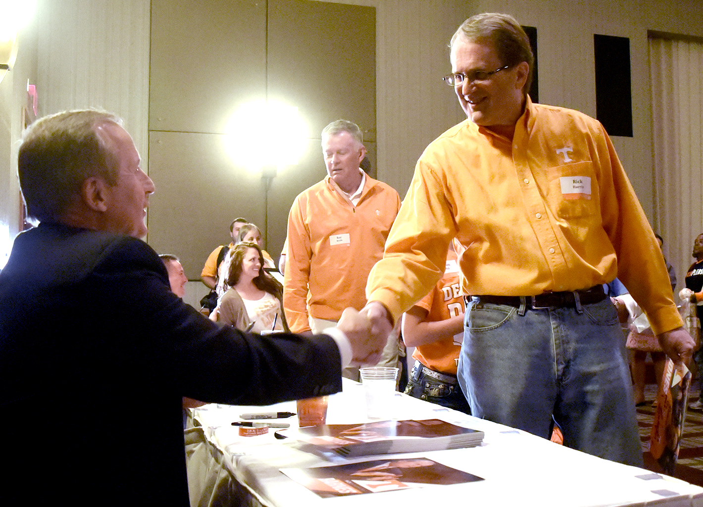 Rick Harris, right, meets UT head mens basketball coach Rick Barnes.  The University of Tennessee Big Orange Caravan rolled into town at the Chattanoogan on Thursday May 5, 2016.