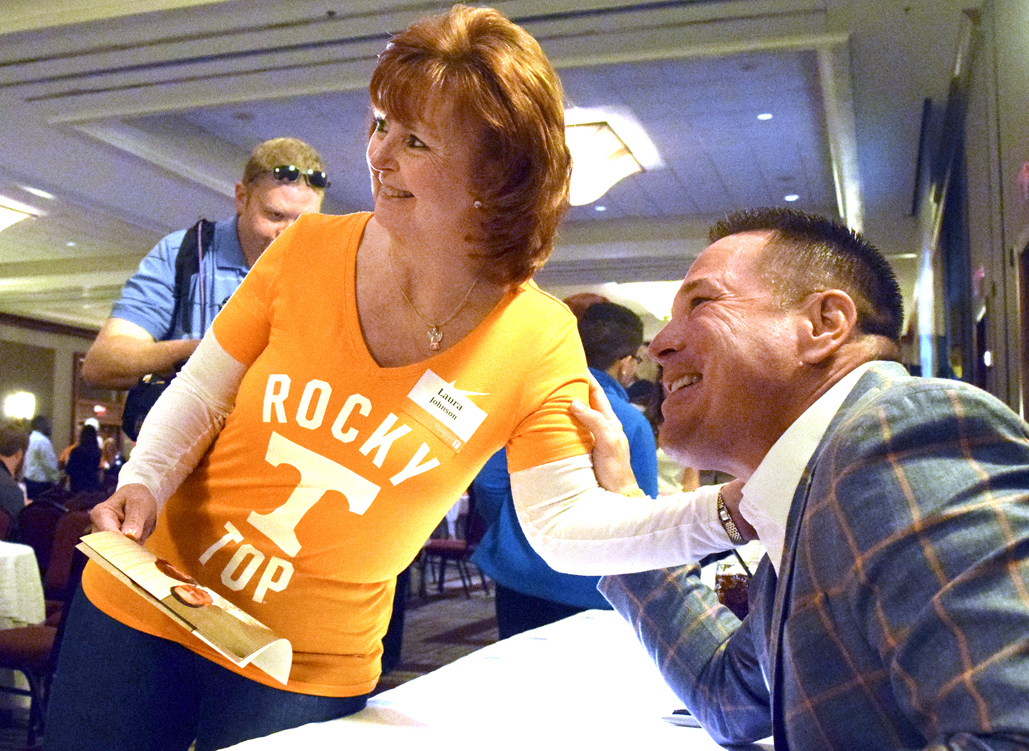 Laura Johnson has her photo made with UT head football coach Butch Jones.  The University of Tennessee Big Orange Caravan rolled into town at the Chattanoogan on Thursday May 5, 2016.