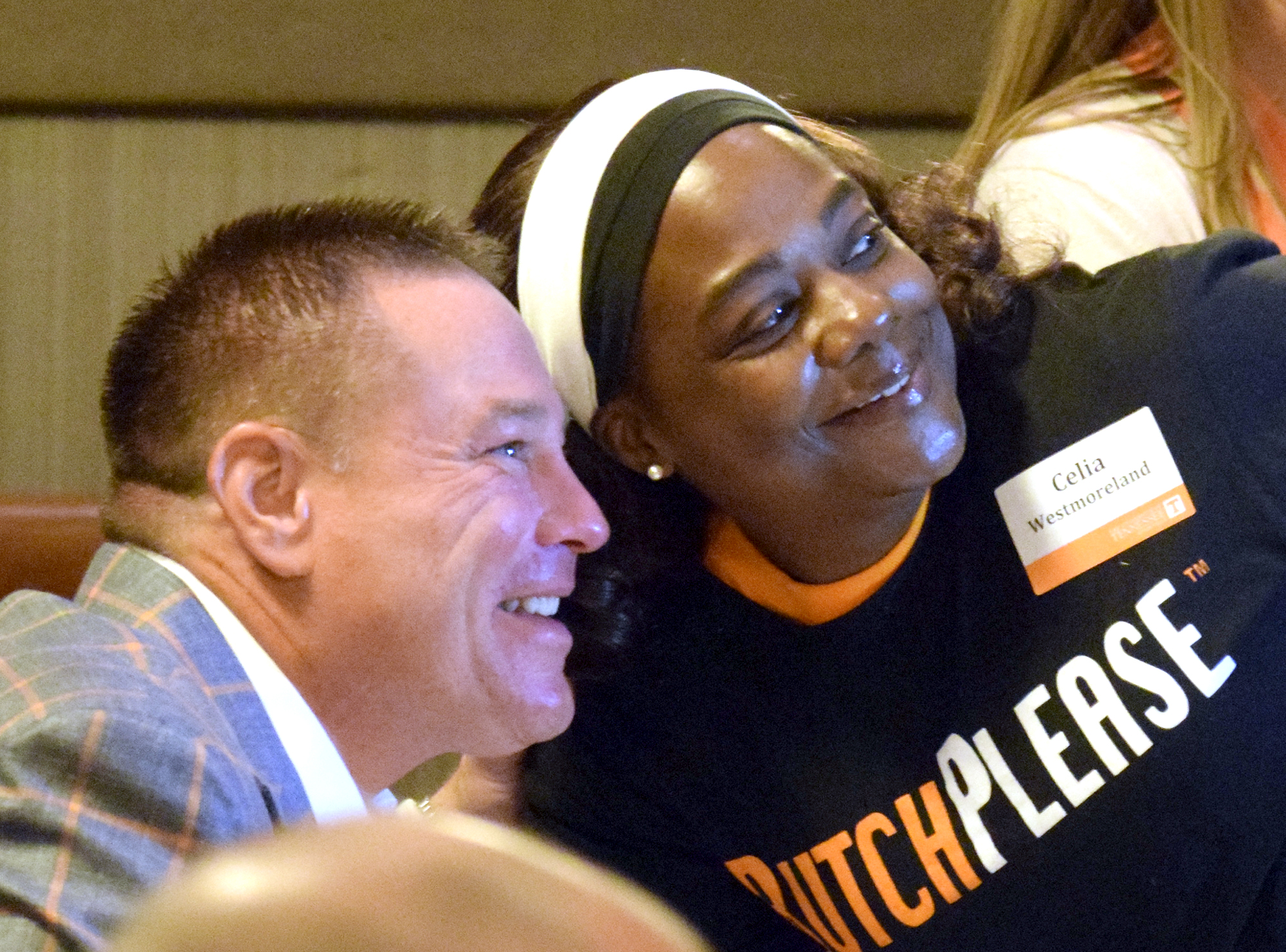 Celia Westmoreland has her photo made with UT head football coach Butch Jones.  The University of Tennessee Big Orange Caravan rolled into town at the Chattanoogan on Thursday May 5, 2016.