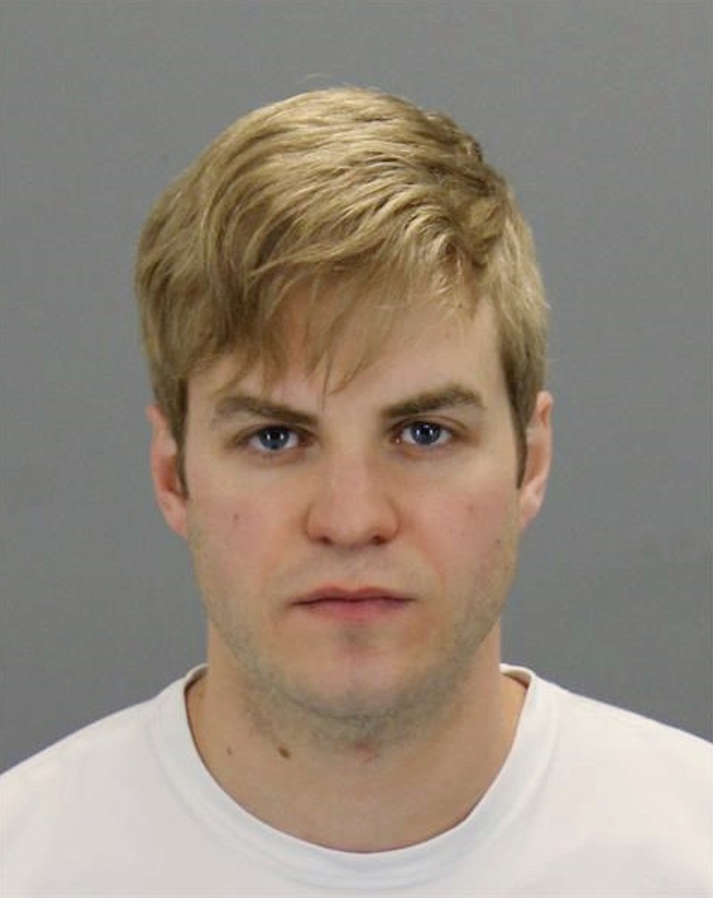 
              This undated photo provided by the Washtenaw County Sheriff's office shows Kyle Bessemer. Bessemer, suspected of spraying a contaminant on unpackaged food at grocery stores, faces four charges of poisoning food. The Michigan man appeared in an Ann Arbor court Thursday, May 5, 2016, two days after his arrest. The FBI says Bessemer admitted to spraying a mixture of hand sanitizer, water and mouse poison on produce and food bars at three Ann Arbor stores: Whole Foods, Meijer and Plum Market. (Washtenaw County Sheriff's office via AP)
            