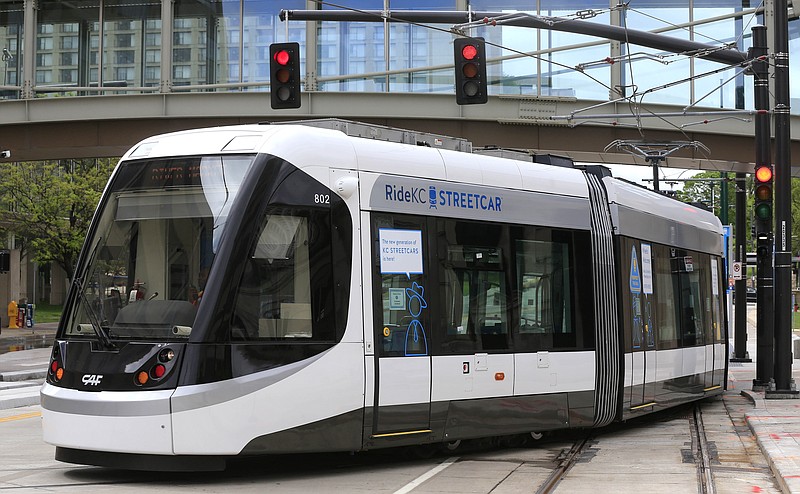 
              In this Wednesday, April 27, 2016 photo, a streetcar takes a practice run along Main Street in Kansas City, Mo. A city that once had one of the nation’s largest streetcar networks is preparing to launch smaller, modern version that supporters say will shape development for years to come. Kansas City is celebrating the opening of its 2.2-mile streetcar line on Friday, May 6, 2016, with street parties, speeches and fireworks. (AP Photo/Orlin Wagner)
            