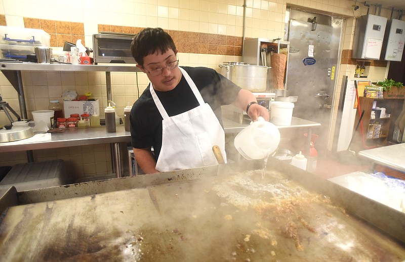 Andrew Ankar works Friday, May 6, 2016 in the Hixson Ankar's Hoagies. 