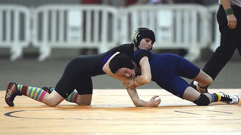 Sequatchie County's Katie Brock, top, controls Caitlyn Green of Northeast in their 105-pound championship final at the TSSAA wrestling state tournament in Franklin this past February. Brock, who won the match to finish the season 31-0 and earn her fourth state title, is the Tricia Saunders High School Excellence Award recipient for 2016. The award is presented by the National Wrestling Hall of Fame and recognizes "excellence in wrestling, scholastic achievement, citizenship and community service," according to a release from the hall.