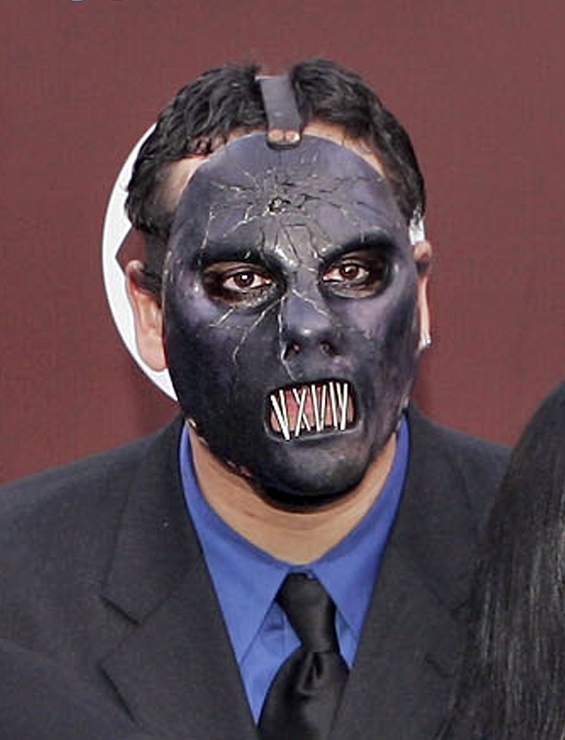
              FILE - In this Feb. 13, 2005 file photo, Paul Gray from the group Slipknot arrives for the 47th Annual Grammy Awards in Los Angeles. The Iowa Supreme Court says the deceased Slipknot bassist's daughter may sue for loss of a parent's companionship, even though she was born after her father died. The ruling Friday May 6, 2016, comes in the wrongful death lawsuit that Gray's widow filed after the heavy metal bassist died of a drug overdose in May 2010. (AP Photo/Mark J. Terrill, File)
            
