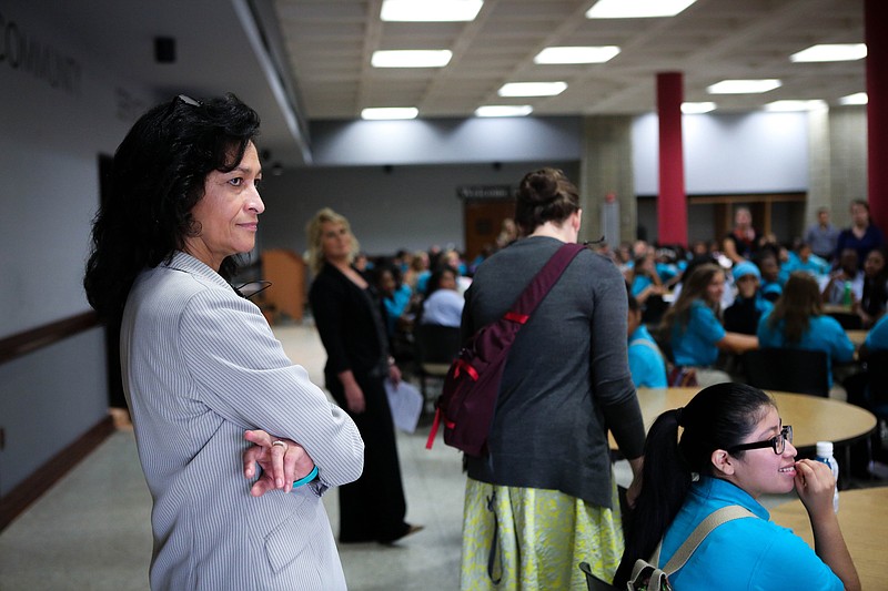 CGLA Executive Director Elaine Swafford looks across tables of students on the first day of the 2015 school year.