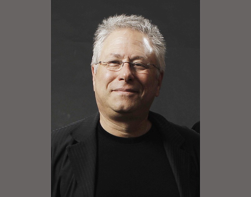 
              FILE - In this Feb. 7, 2011 file photo, songwriter Alan Menken, poses for a portrait before the Academy Award Nominees Luncheon in Beverly Hills, Calif. Menken write the music for the Disney classic, "Beauty and the Beast," celebrating its 25th anniversary this year. (AP Photo/Matt Sayles, file)
            