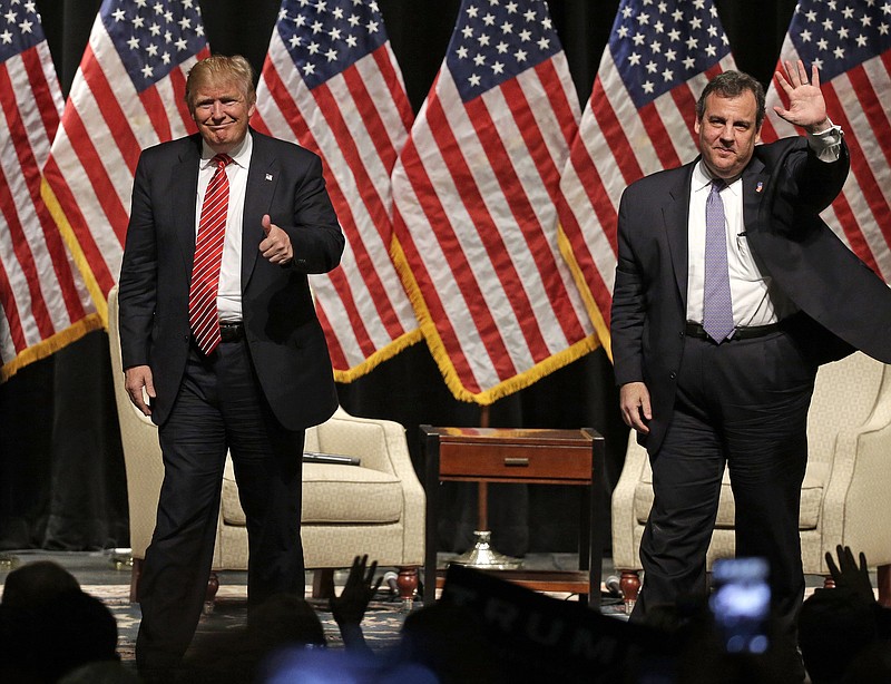 
              FILE - In this March 14, 2016 file photo, Republican presidential candidate Donald Trump gives a thumbs up as New Jersey Gov. Chris Christie waves to the crowd as they walk off the stage after a rally at Lenoir-Rhyne University in Hickory, N.C.  Christie’s decision to endorse Donald Trump back in February brought him plenty of derision at the time. But it’s bringing rewards now that it’s clear he bet on the winner. (AP Photo/Chuck Burton, File)
            