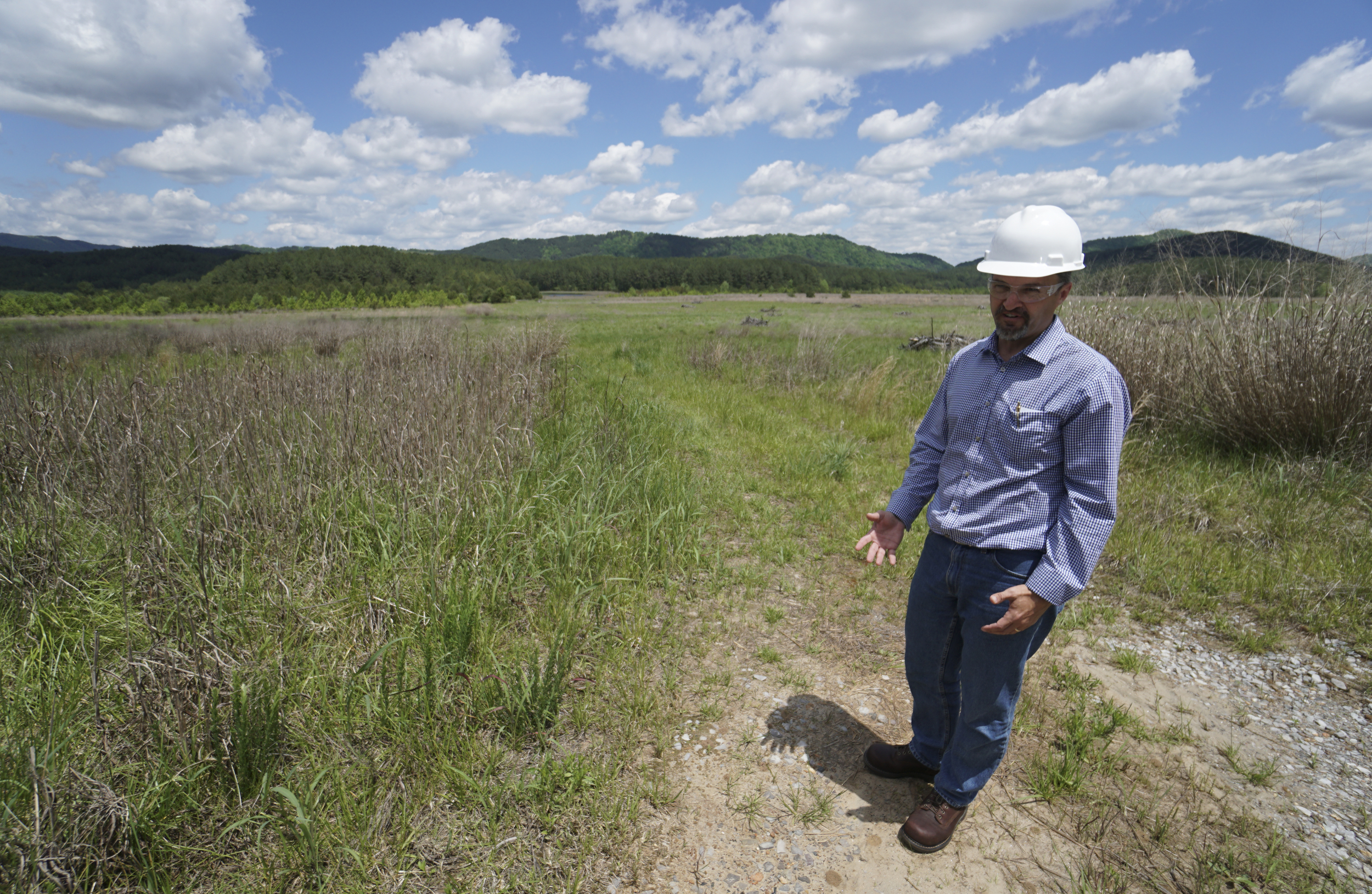 Rick Passmore, project manager, speaks about progress made to the Tailings Pond area in the Copper Basin.