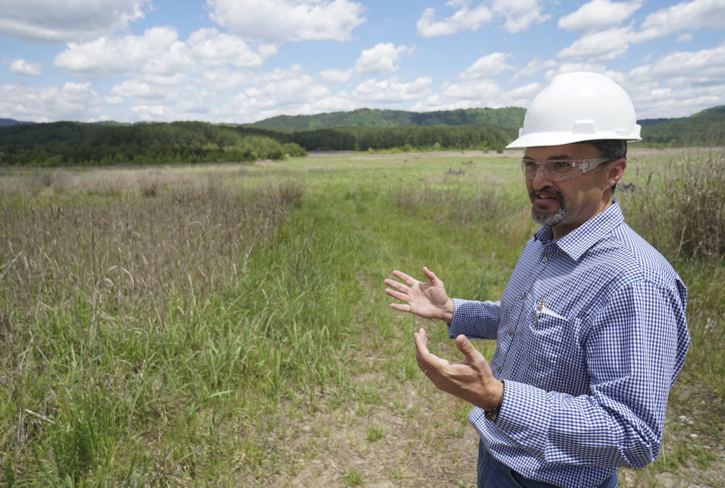 Rick Passmore, project manager, speaks about progress made to the Tailings Pond area in the Copper Basin.