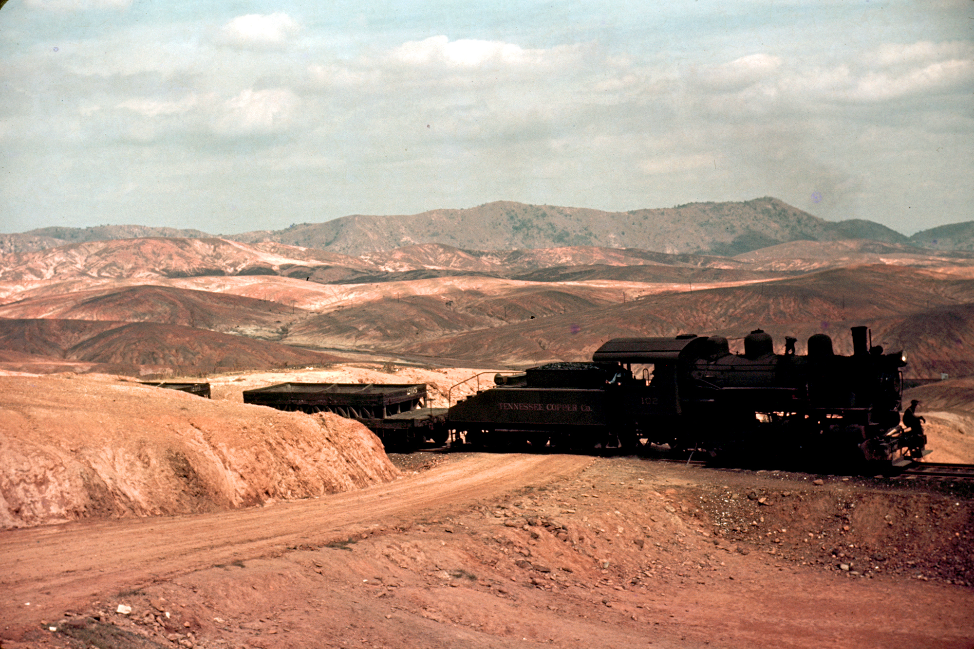 This 1939 photo shows a train bringing copper ore out of mine in Ducktown, Tenn. Sulfuric acid fumes from smelting copper destroyed all vegetation and eroded the land.